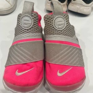Pink and gray Nikes